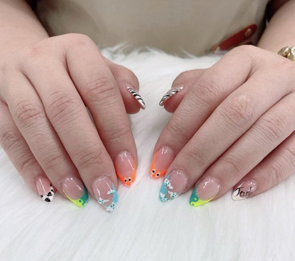cute summer nails in Yarmouth with pastel colors and fish design