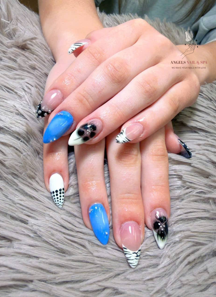 modern nail art with mixed patterns and bold colors at nail salon in Yarmouth