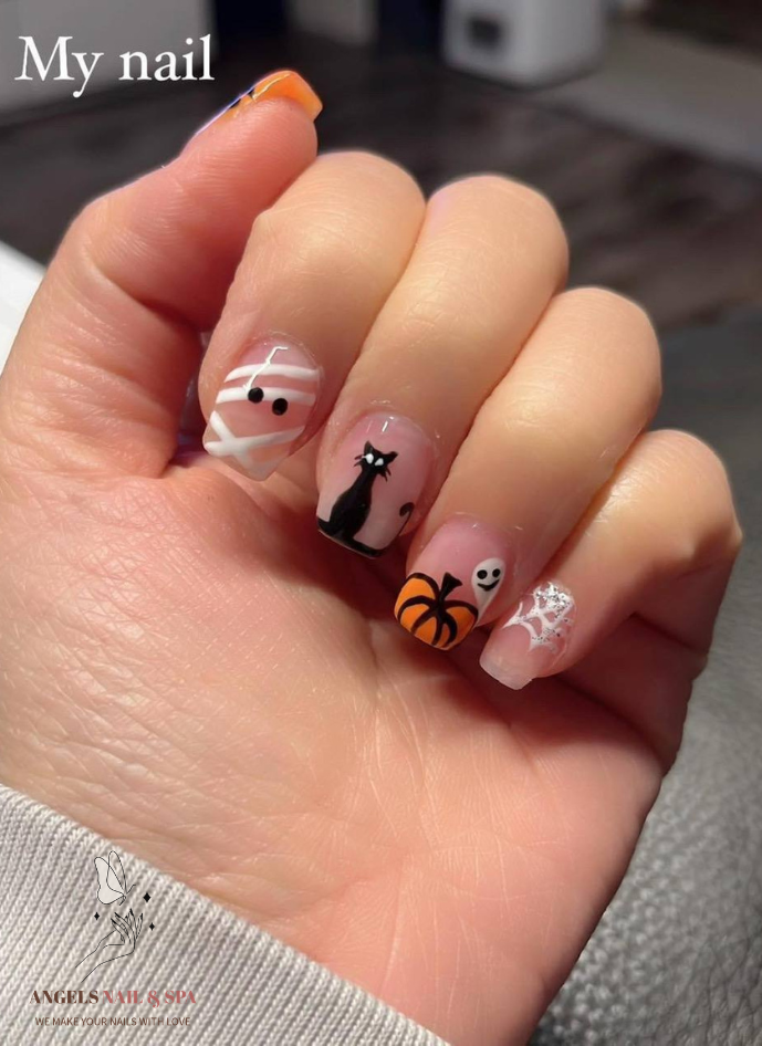 Cute Halloween nails with mummy cat pumpkin ghost nail art Yarmouth nail salon
