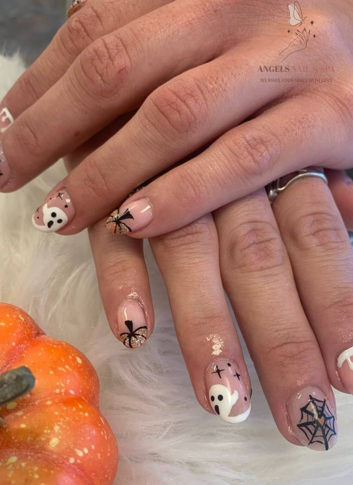 Minimal Halloween nails with ghost spider web pumpkin design nude nails Yarmouth