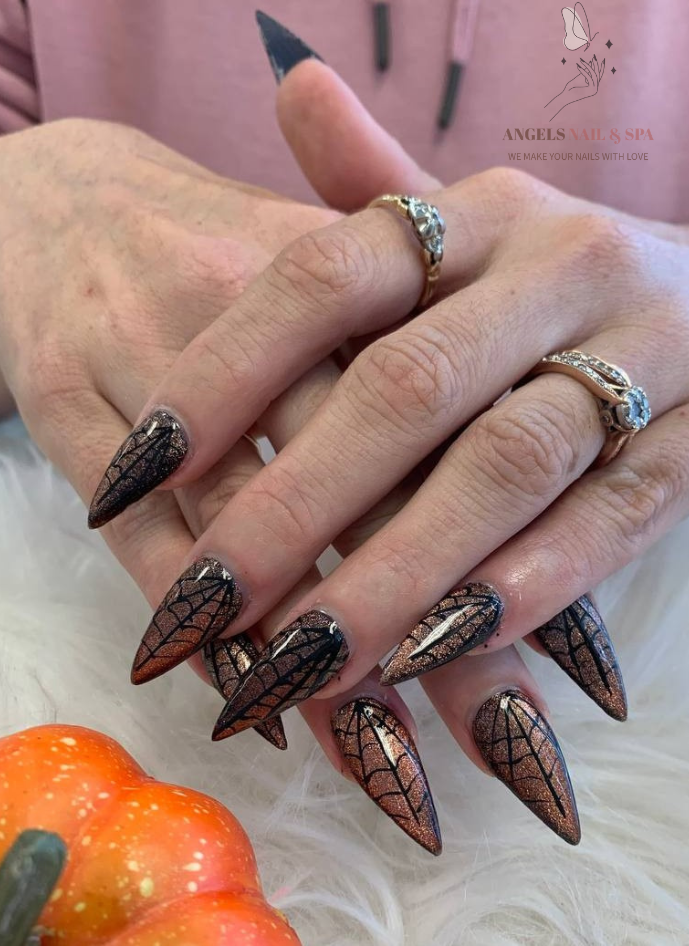 Halloween nails with spider web design glitter ombre long nails Yarmouth nail salon