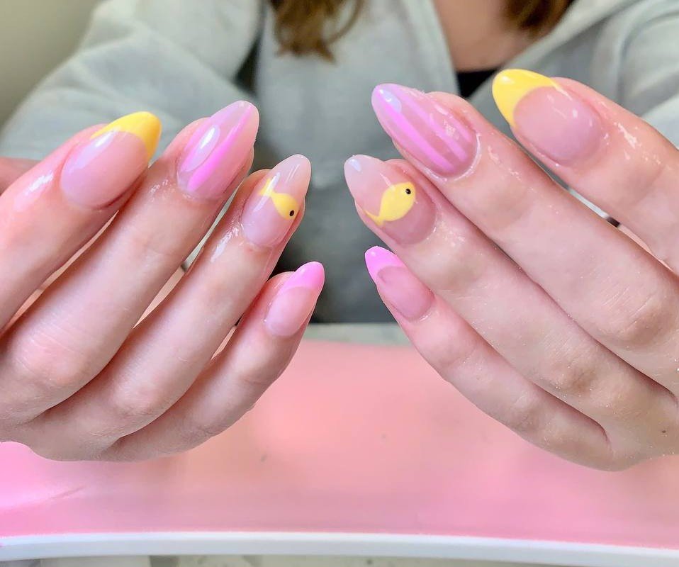 trendy nail design with neon tips and cute nail art at Angels Nail & Spa