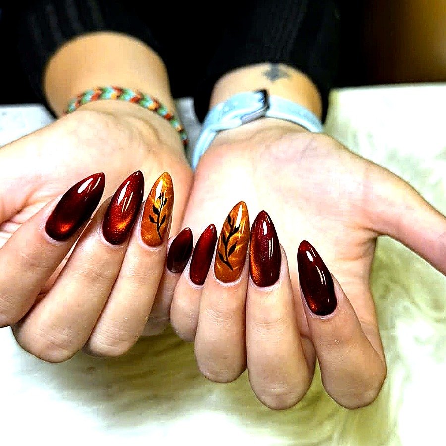 Autumn burgundy copper leaf nail art by Angels Nail & Spa in Yarmouth NS