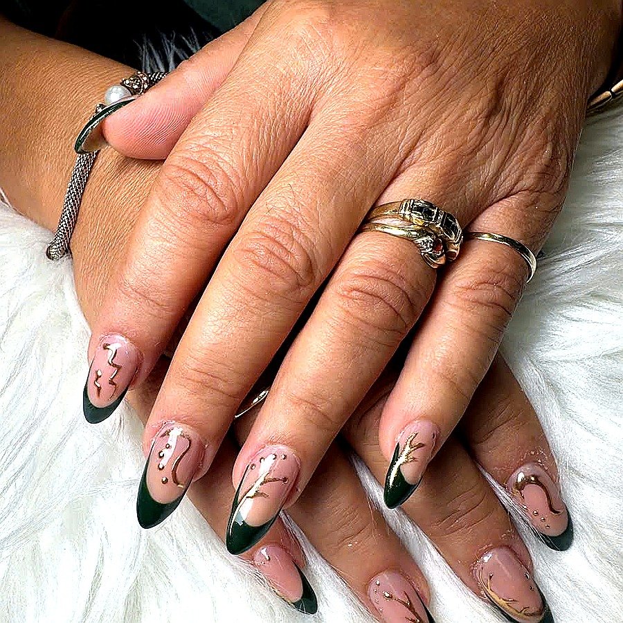 Emerald green gold swirl French tip nails by Angels Nail & Spa in Yarmouth NS