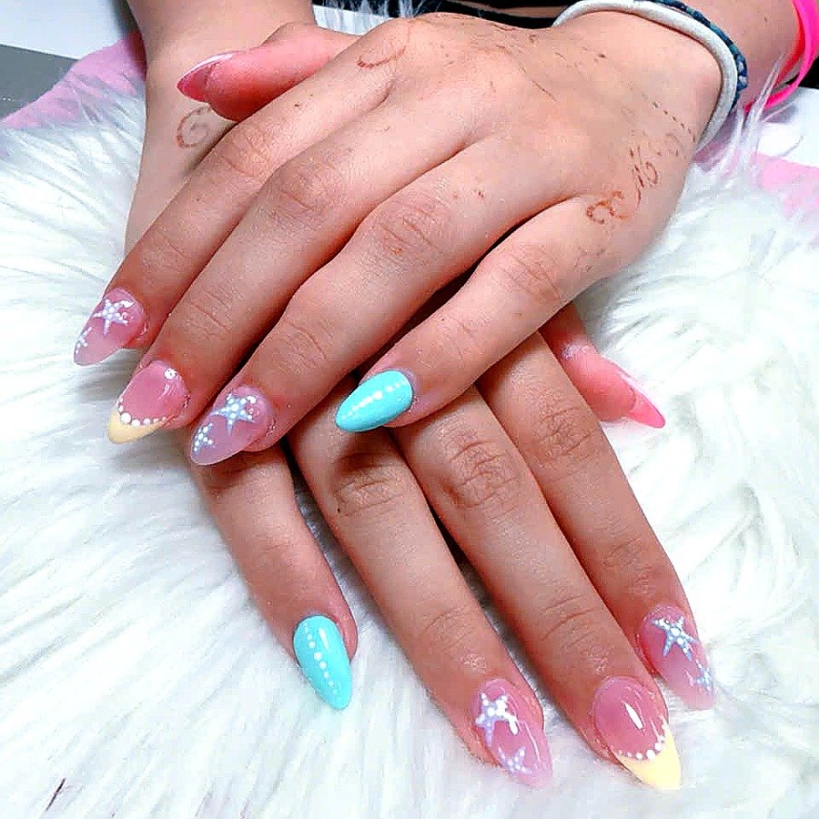 Pastel pink blue kawaii star rhinestone nails by Angels Nail & Spa in Yarmouth NS